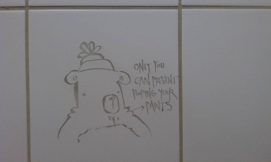 smoky bear pooping funny bathroom graffiti drawing
